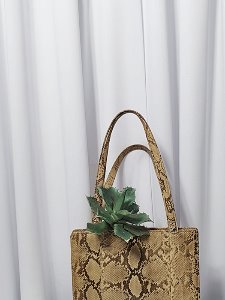[TIME] yellow snake classical tote bag